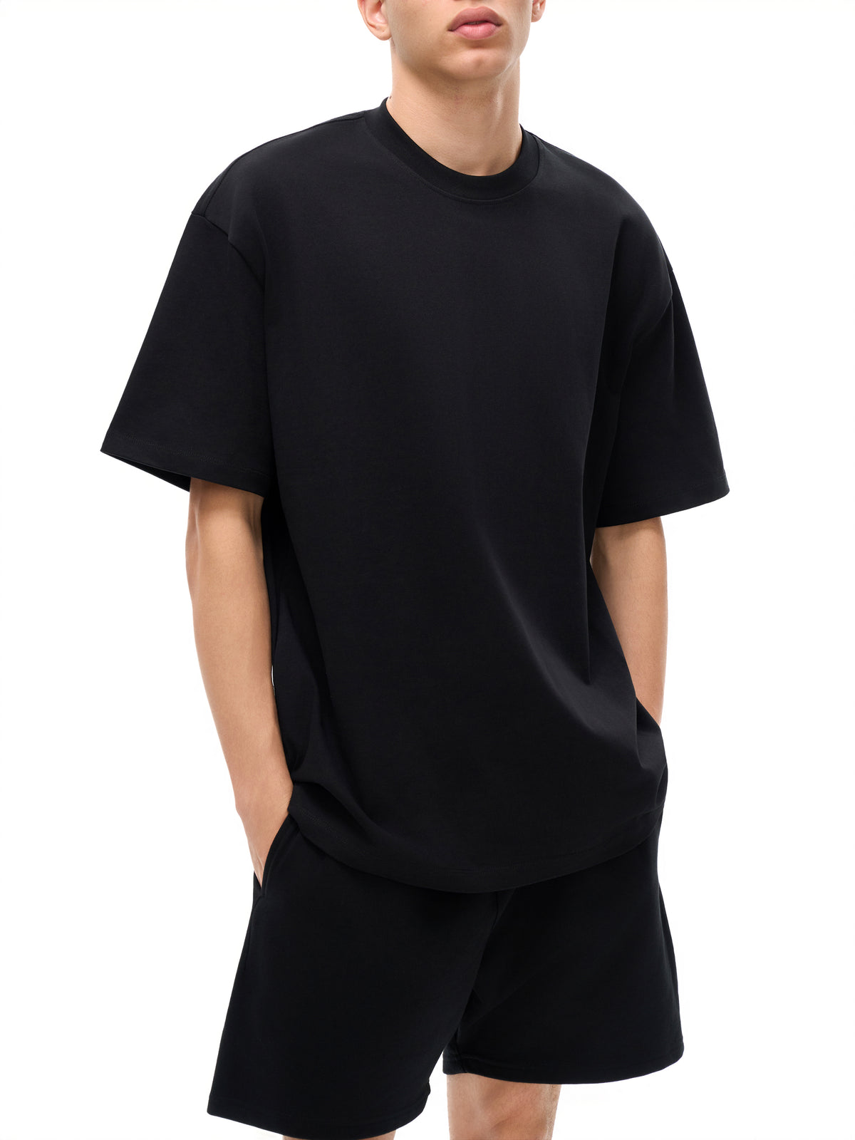 Unisex heavyweight Earth Tone T-shirt in Black – front fit view