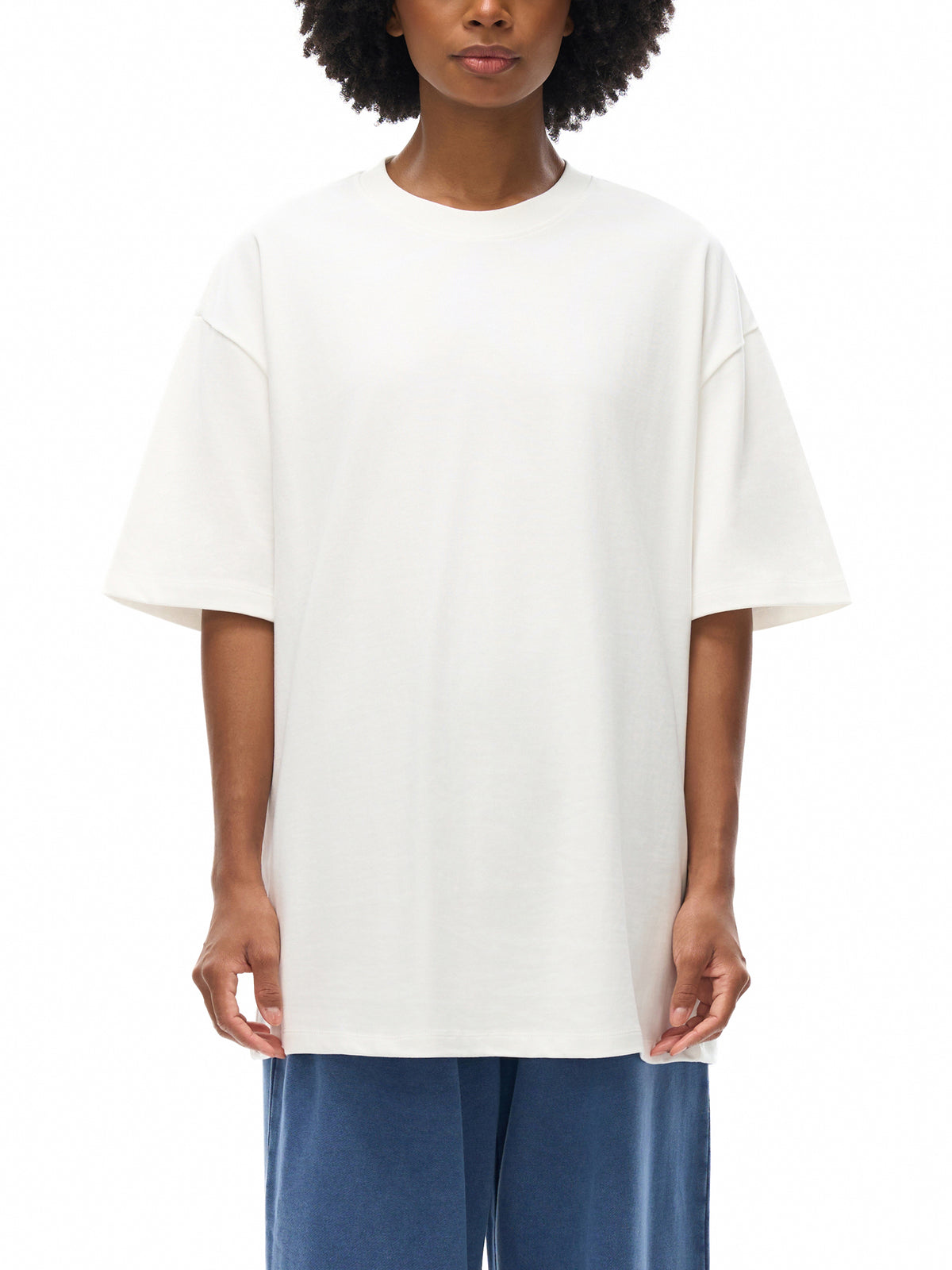Unisex heavyweight Earth Tone T-shirt in White – front model view