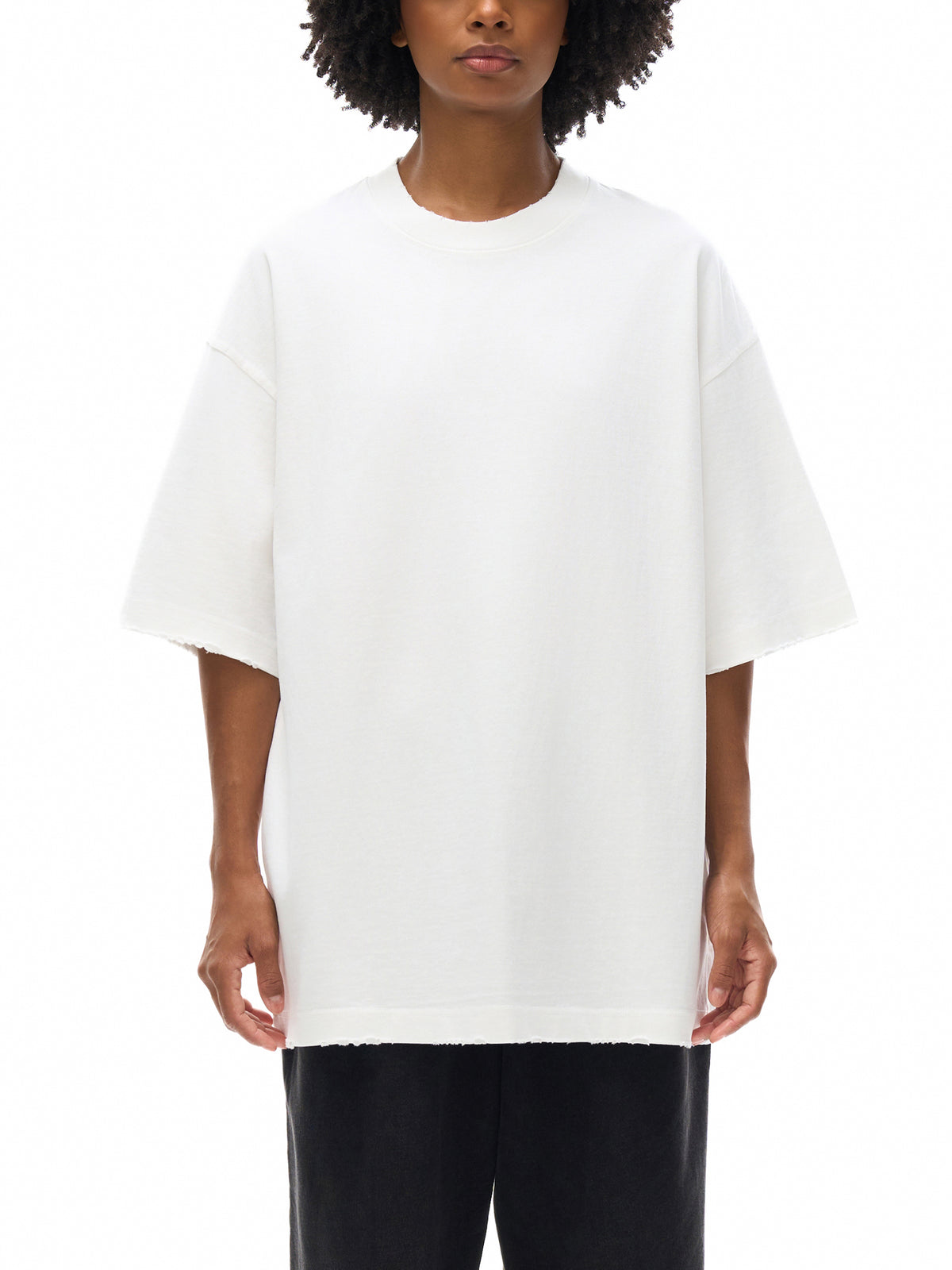 Unisex heavyweight hand-frayed T-shirt in White – front model view