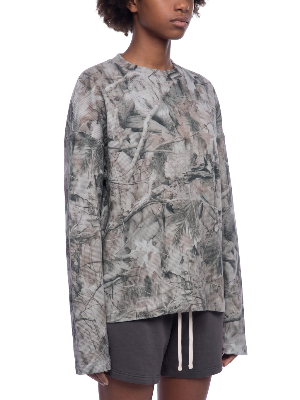 Unisex Tree Camo Waffle T-Shirt on female model front angle