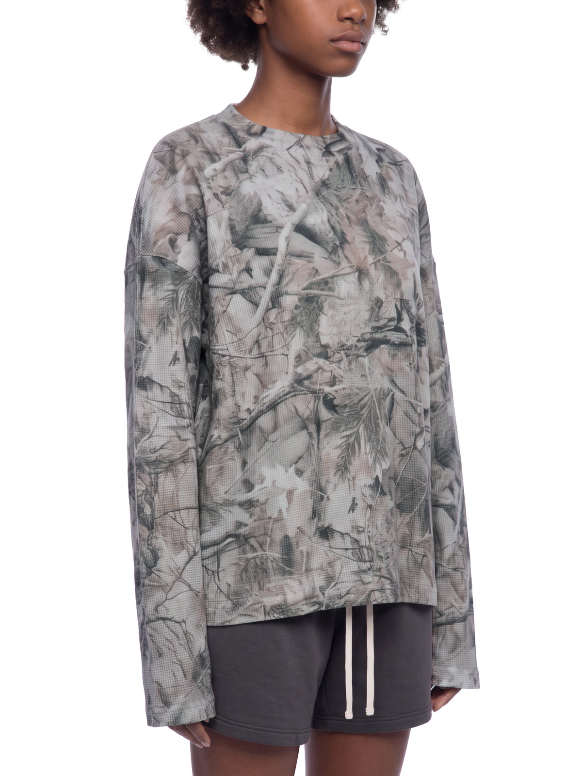 Unisex Tree Camo Waffle T-Shirt on female model front angle