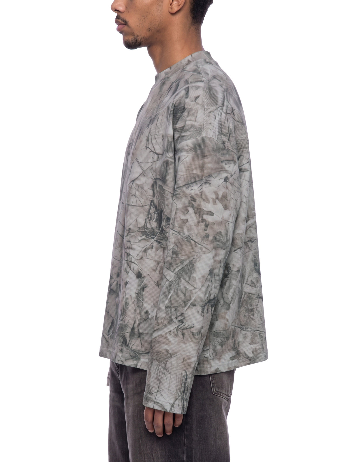Unisex Tree Camo Waffle T-Shirt on male model side view