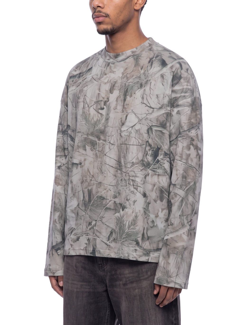 Unisex Tree Camo Waffle T-Shirt on male model front angle