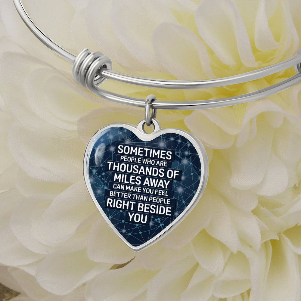 Thousands of Miles Away Luxury Heart Bangle