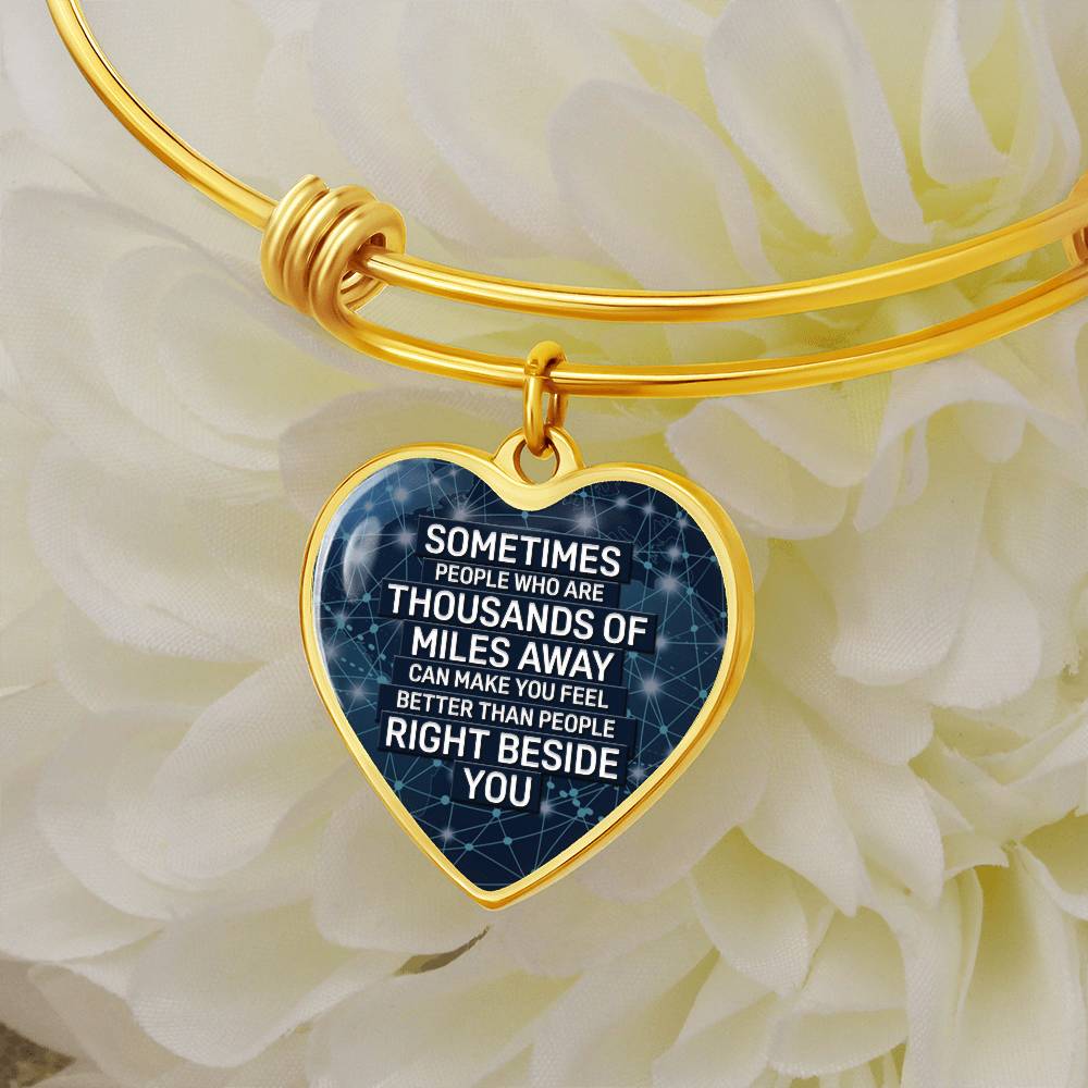 Thousands of Miles Away Luxury Heart Bangle