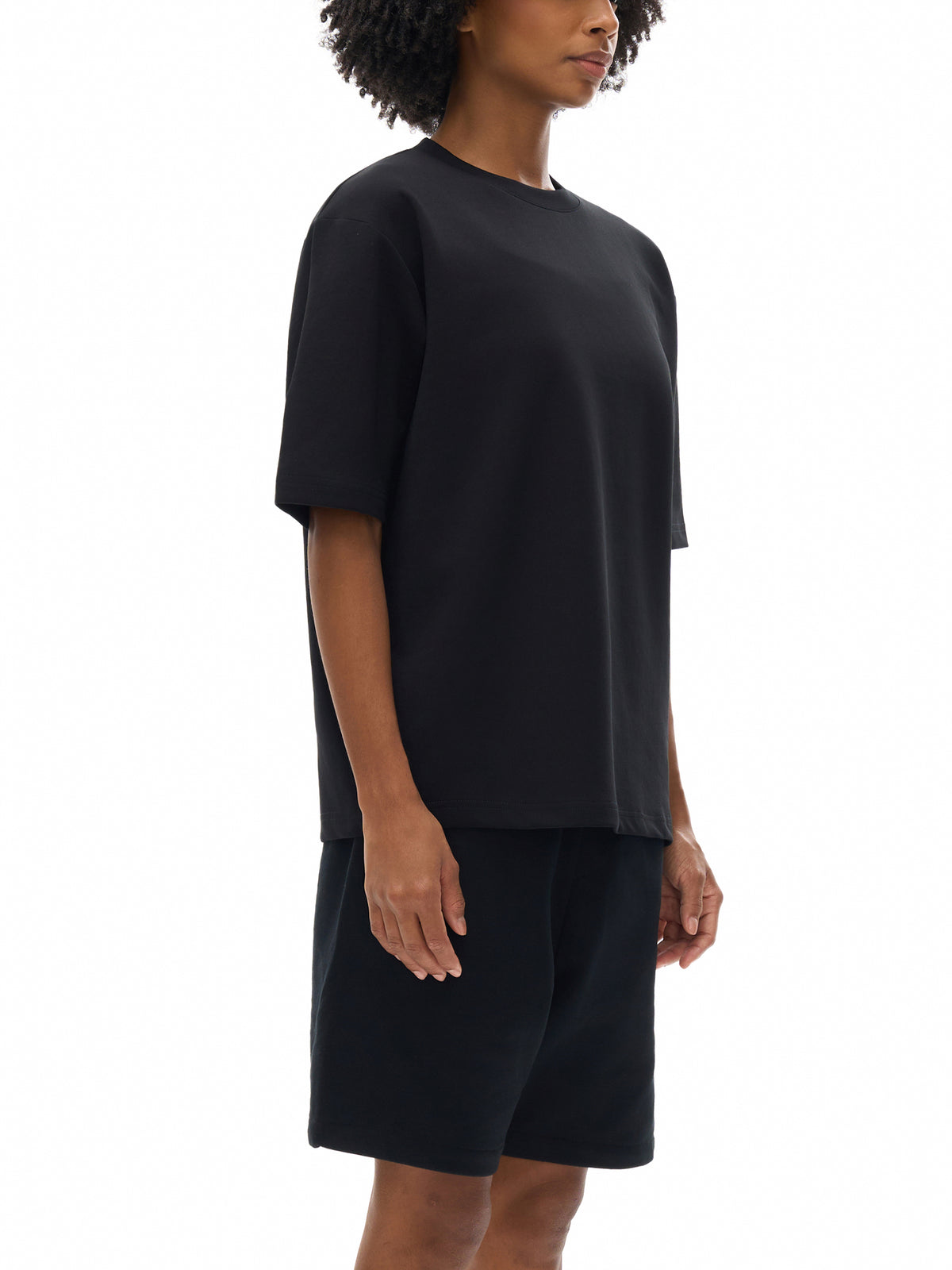 Black Essential Cooling Performance T-Shirt on model side view