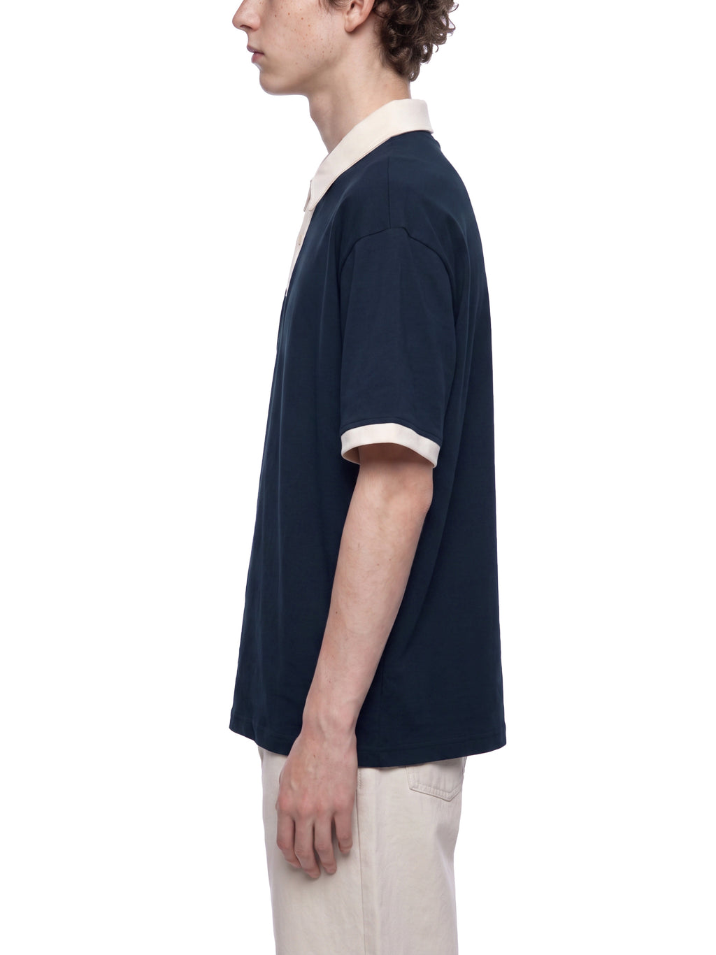 Off Script Unisex Color Block Polo Shirt on male model side view