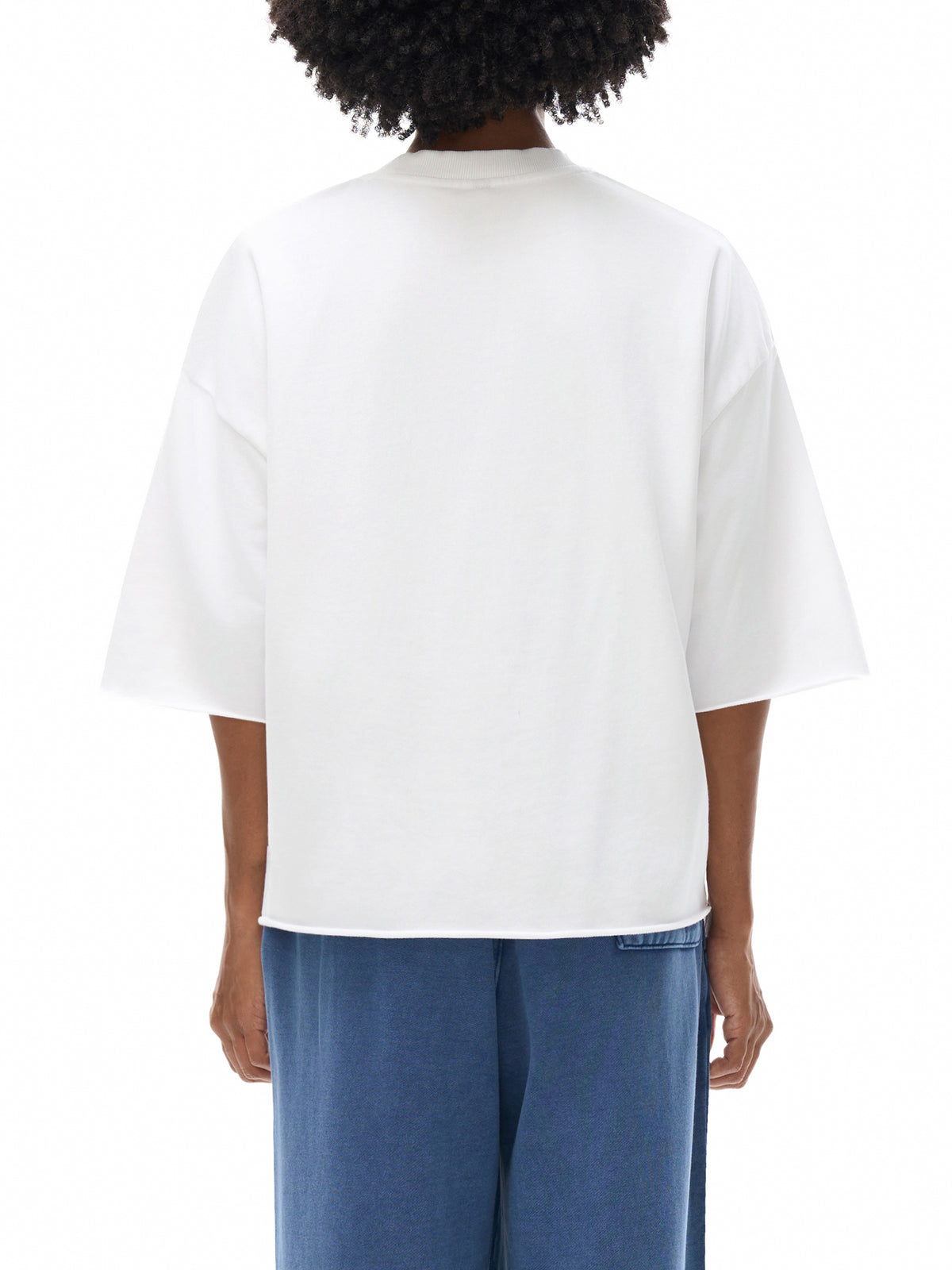 Unisex French Terry Raw-Edge T-Shirt in White - model back view