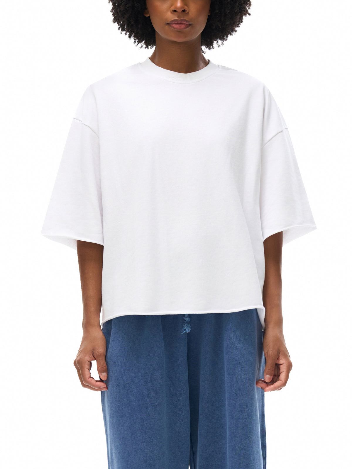 Unisex French Terry Raw-Edge T-Shirt in White - model front view