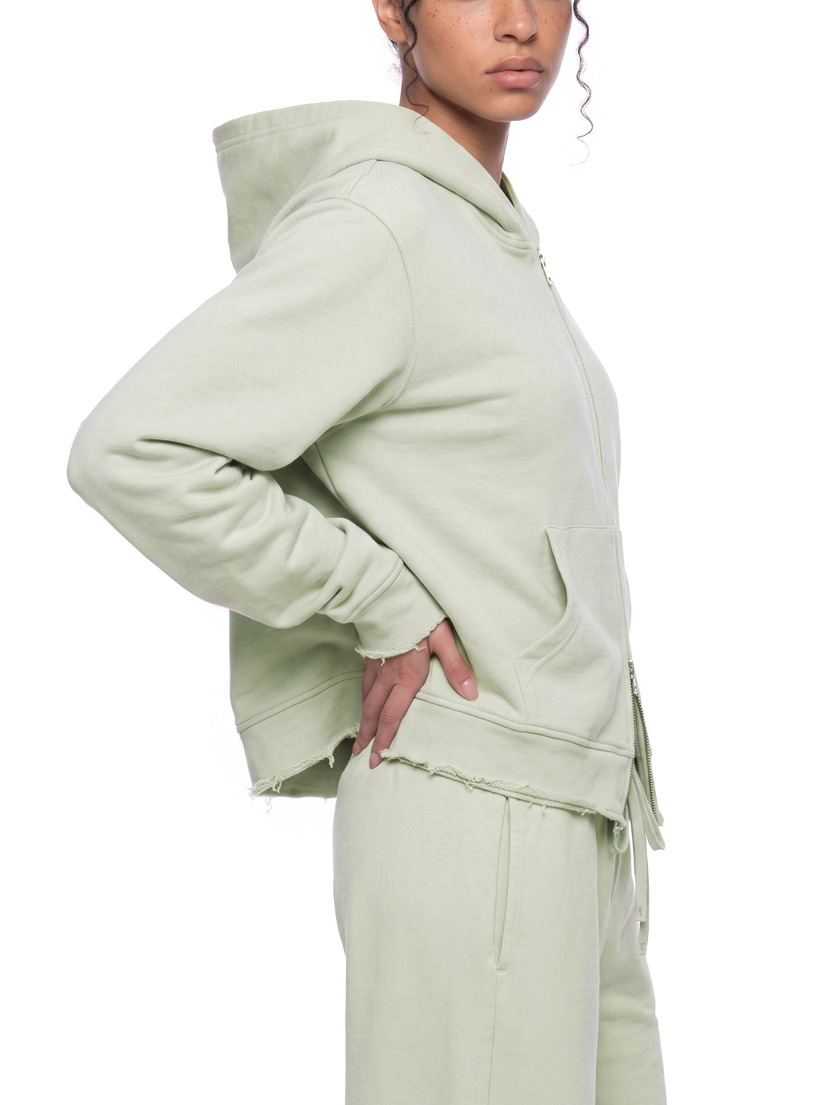 Women’s Raw Edge Full Zip Hoodie white gray model angled side view